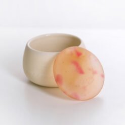 orange glass lidded urn