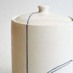 Porcelain Cremation Urn Lines V2 – white porcelain urn blue line design, handmade by Liz O’Dwyer - urn studios UK