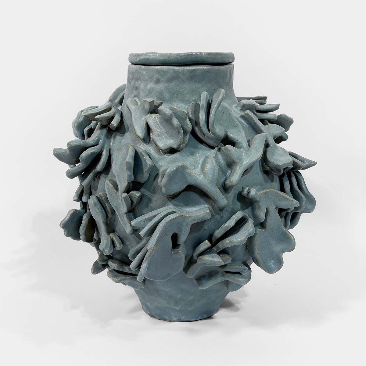 Flutter • Floral Relief Cremation Urn Abbey Peters Flutter Ceramic Cremation Urn Sculptural Urns for Ashes Handmade Artistic Urn Studios