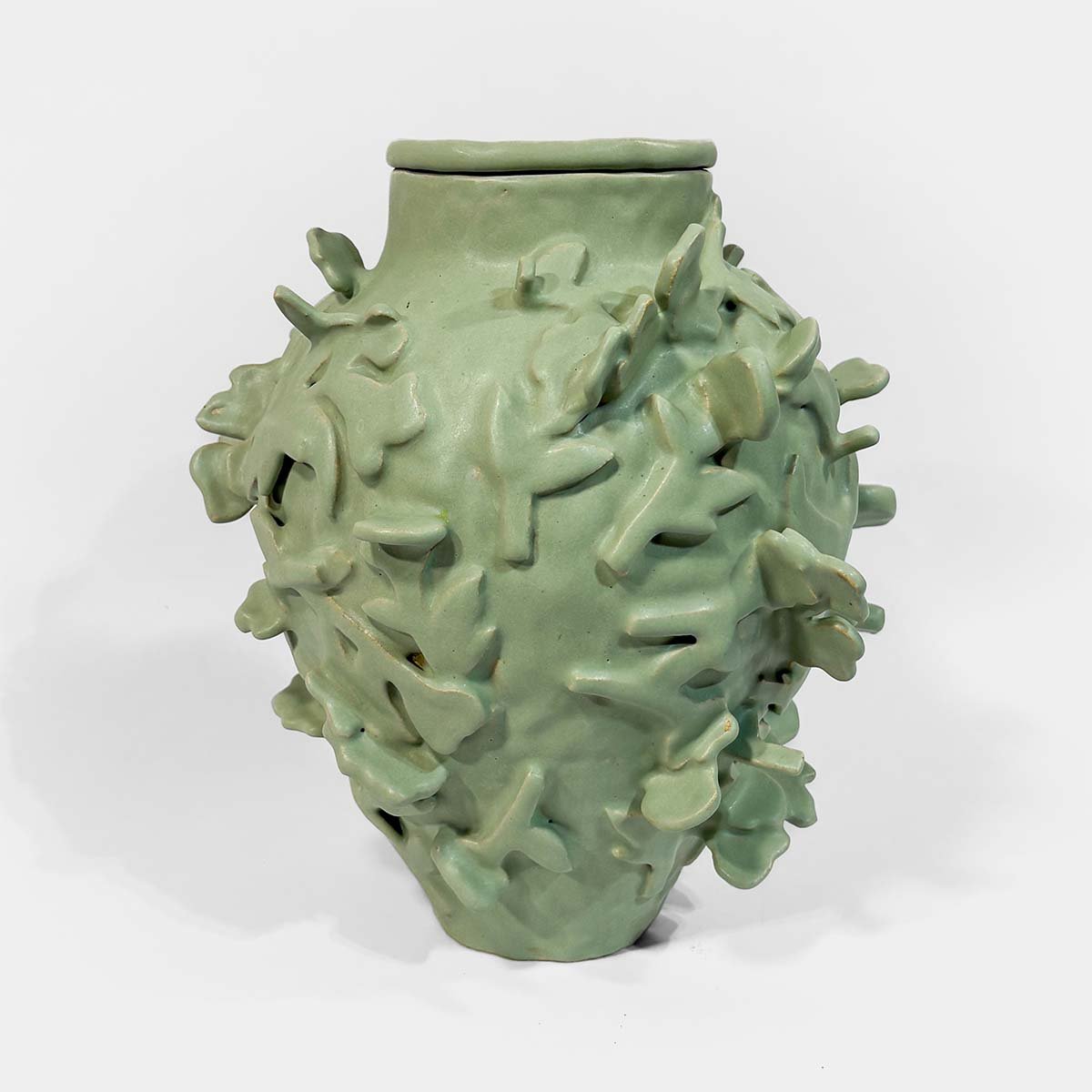 Fences • Leaves Relief Urn for Ashes Abbey Peters Fences Ceramic Cremation Urn Sculptural Urns for Ashes Handmade Artistic Urn Studios