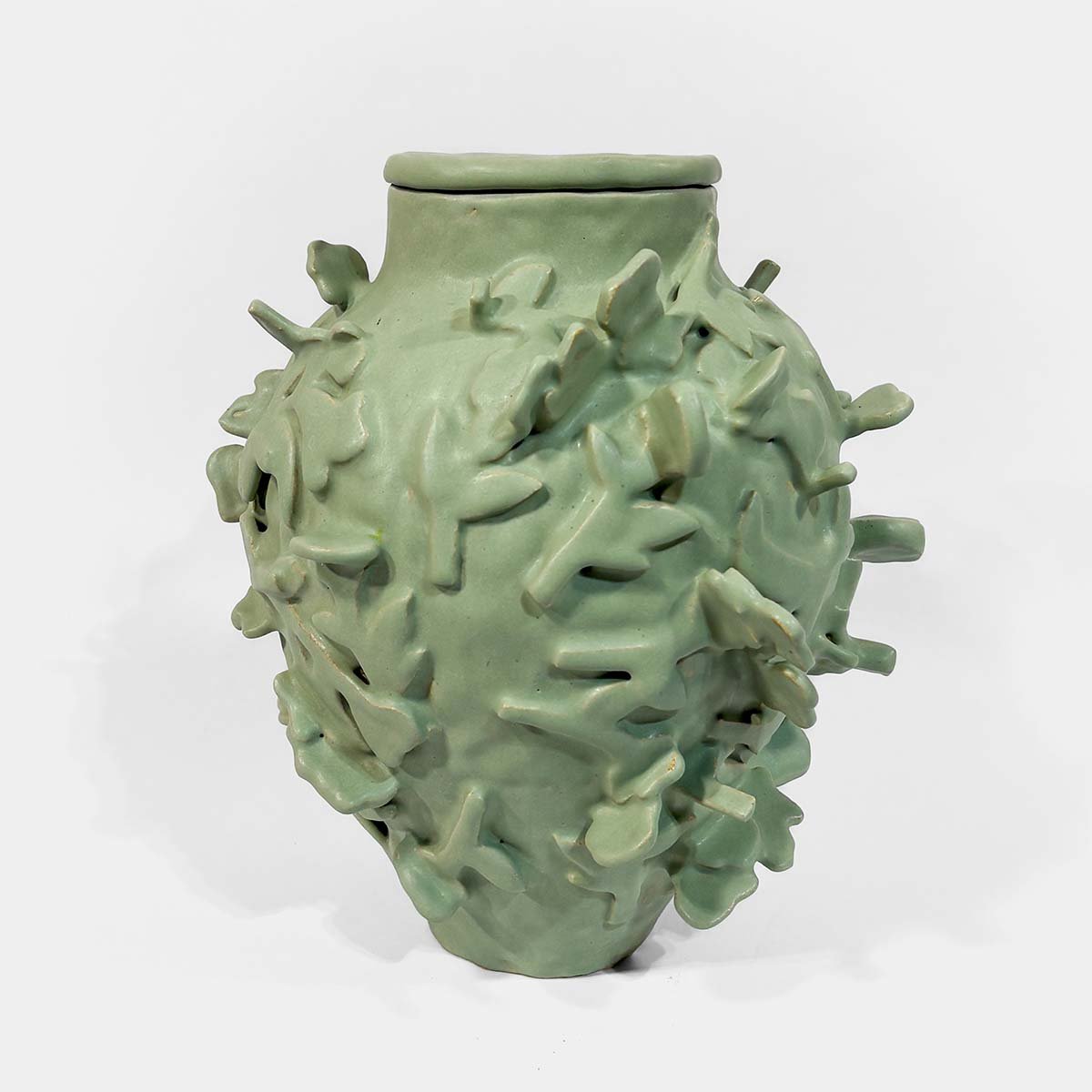 Fences • Leaves Relief Urn for Ashes Abbey Peters Fences Ceramic Cremation Urn Sculptural Urns for Ashes Handmade Artistic Urn Studios