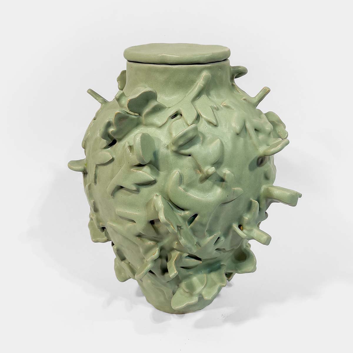 Fences • Leaves Relief Urn for Ashes Abbey Peters Fences Ceramic Cremation Urn Sculptural Urns for Ashes Handmade Artistic Urn Studios