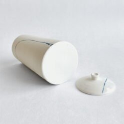 Porcelain Cremation Urn Lines V4 – white porcelain urn blue line design, handmade by Liz O’Dwyer - urn studios UK