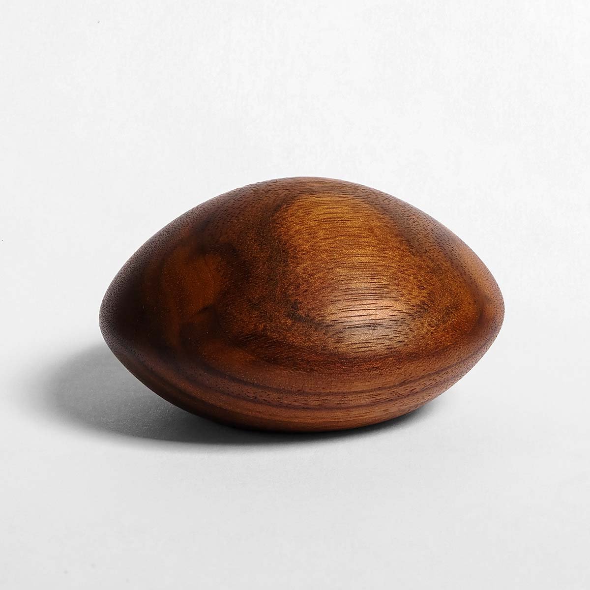 Wooden Pebble Keepsake Urn Keith Jaques Wooden Pebble Urn Walnut Small Keepsake Round Wood Urn Studios Handmade UK